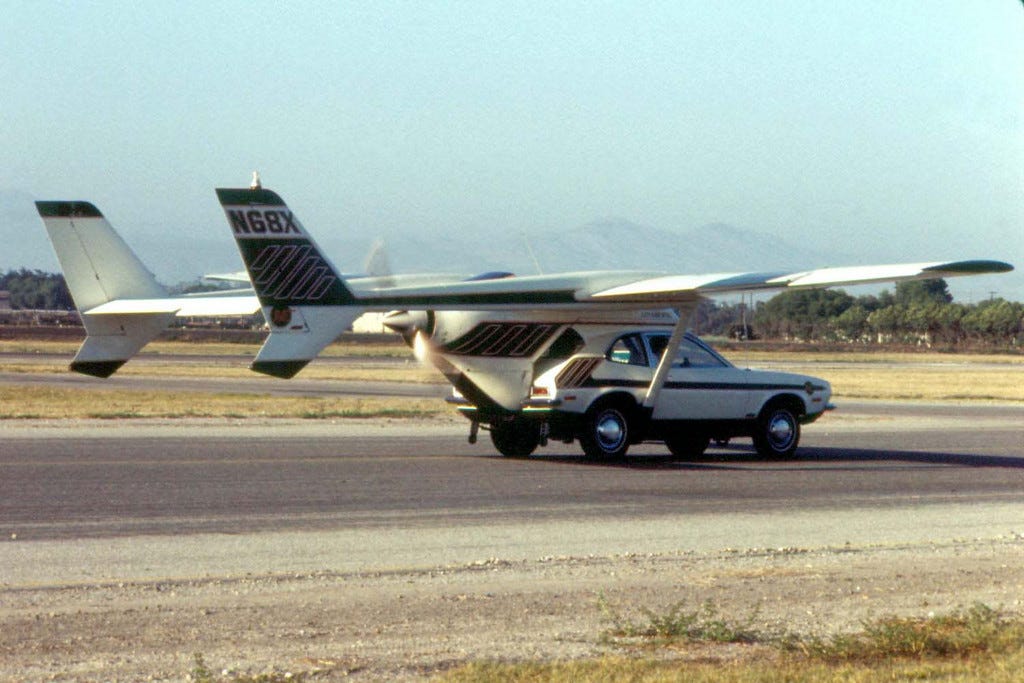 A flying car on the runway at an airport