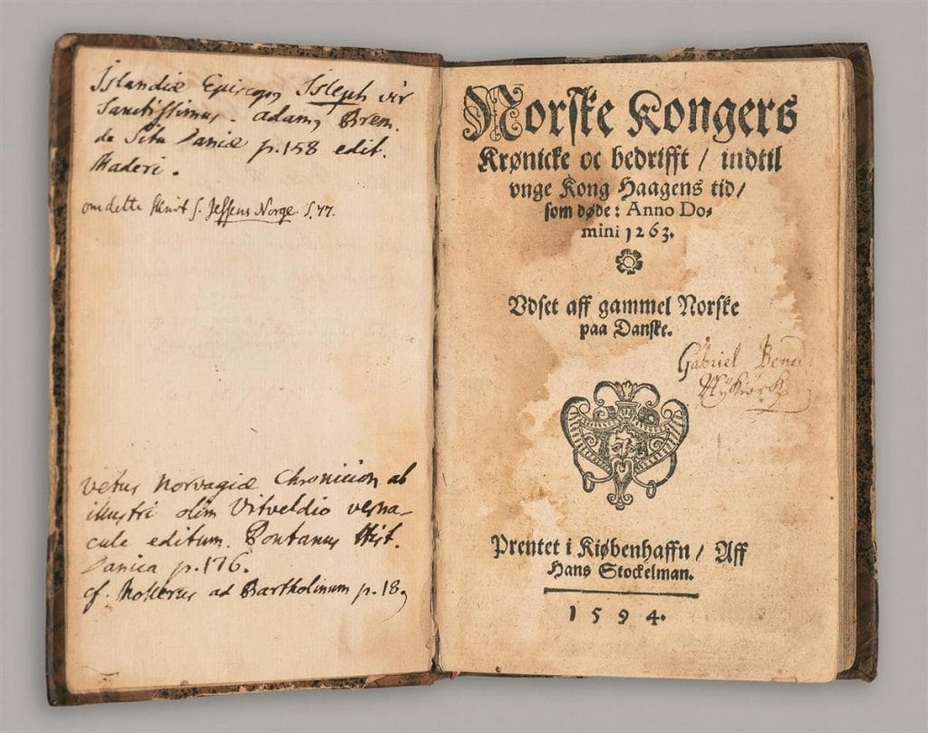 an open book that looks old with writing on the left hand page Haaland