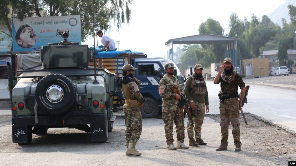 FILE - Taliban security personnel stand guard at the Pakistan-Afghanistan border in Torkham, Afghanistan, on Sept. 15, 2023. FILE - Taliban security personnel stand guard at the Pakistan-Afghanistan border in Torkham, Afghanistan, on Sept. 15, 2023.