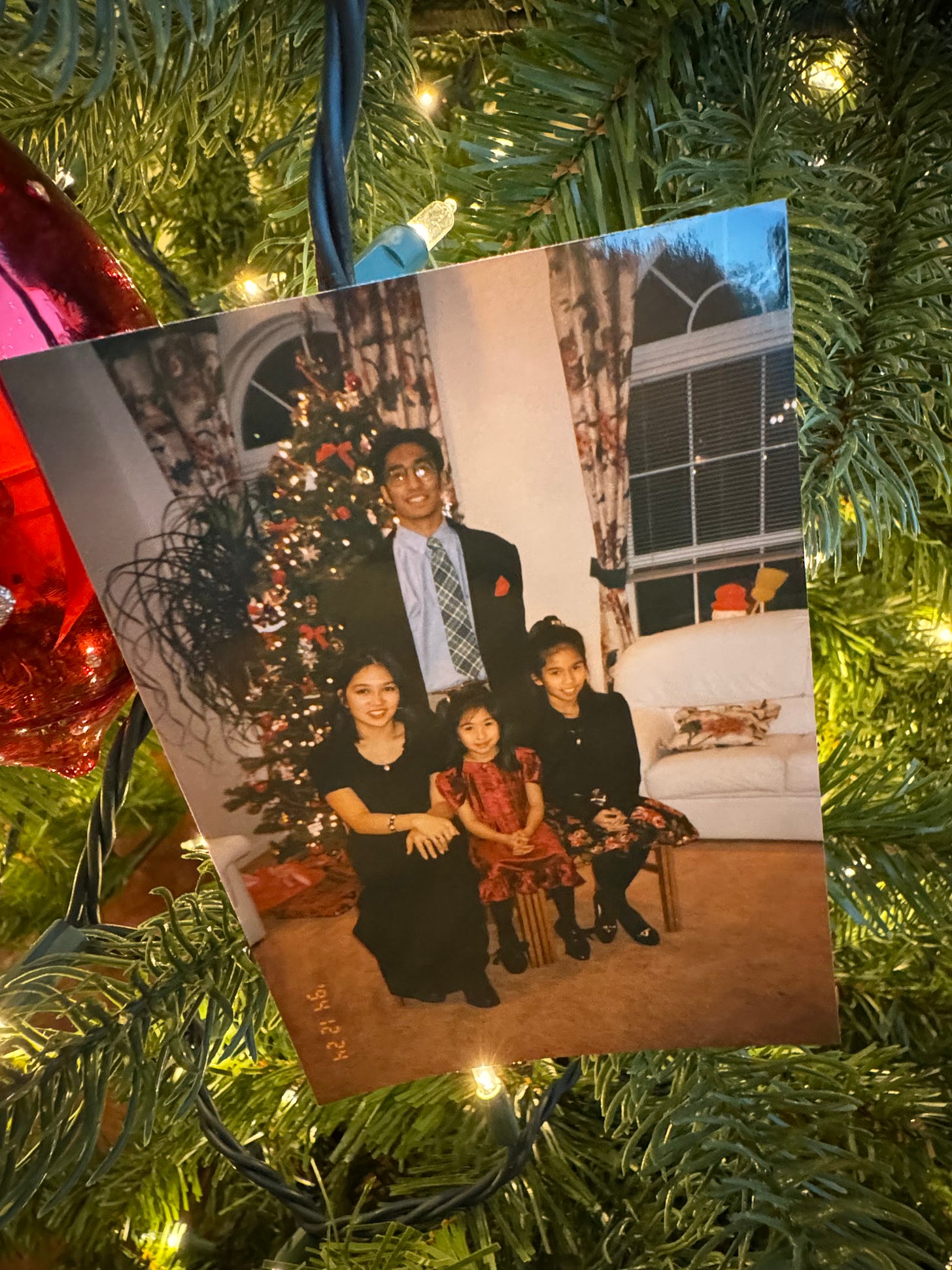 Filipino Family by Christmas Tree