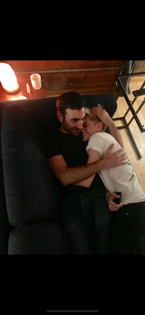 The Friend by Sigrid Nunez, Brett Goldstein and Mae Martin hugging, four patients in hospital gowns (the logo of podcast The Retrievals), Idina Menzel on TikTok, Material Girls podcast logo, the movie Theater Camp's poster
