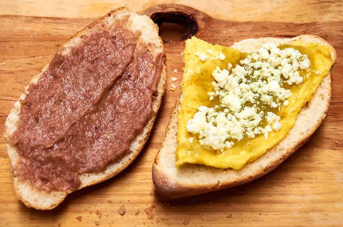 assembling a scrambled egg torta