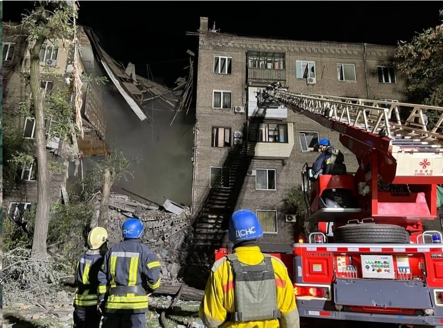 May be an image of 3 people and outdoors