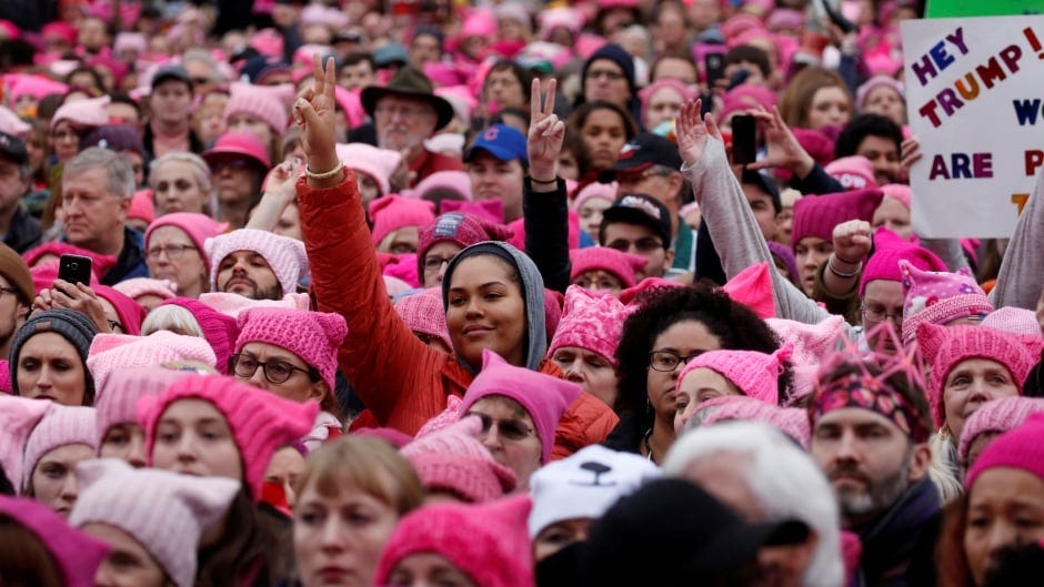 The 'pussyhats' grab back: Massive Women's March on Washington overwhelms  streets | CBC News