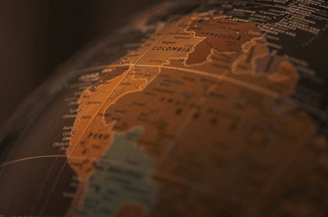 A close up of a globe with a blurry background A close up of a globe with a blurry background