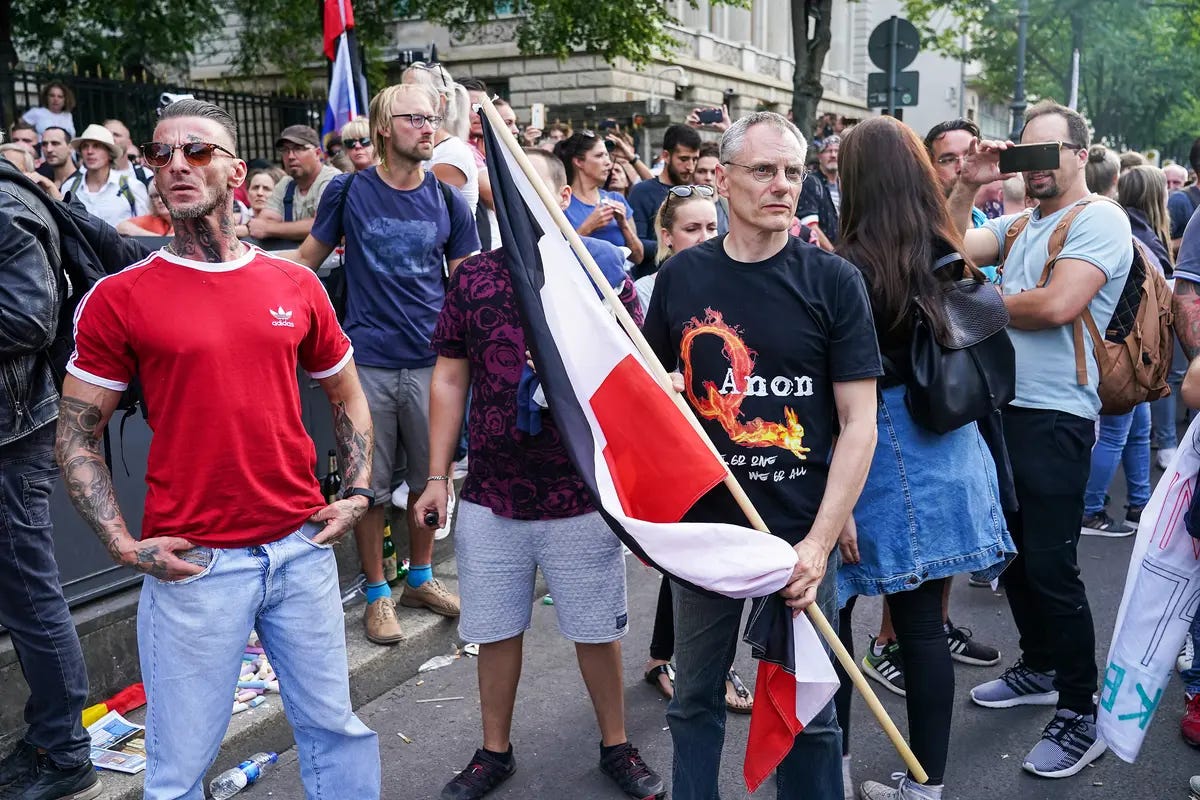 People protest against coronavirus-related restrictions and government policy in Berlin on Aug. 29, 2020. (Sean Gallup/Getty Images) People protest against coronavirus-related restrictions and government policy in Berlin on Aug. 29, 2020. (Sean Gallup/Getty Images)