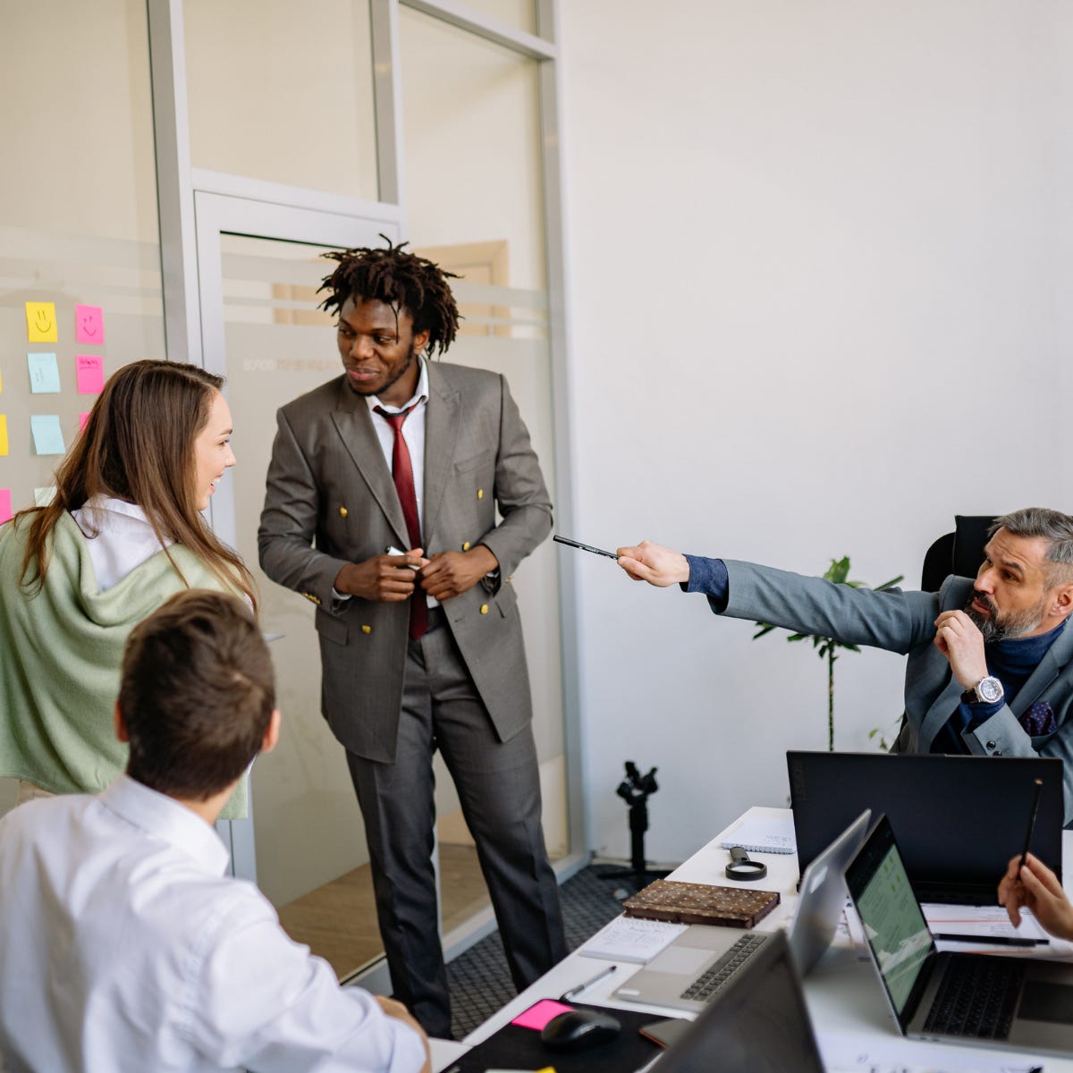 Business team collaborating in a bright office Business team collaborating in a bright office