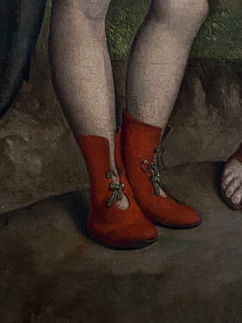 Detail of a red velvet garment in a Venetian painting