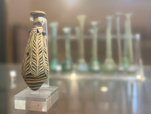 A vase on a stand

Description automatically generated