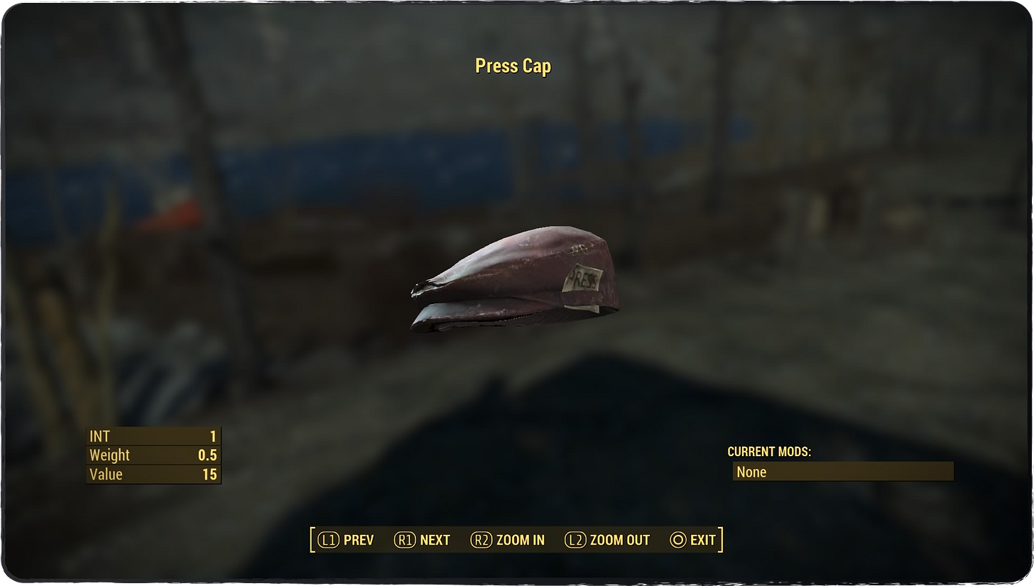 A screenshot showing the Press Cap that Piper wears, showing the side piece of paper that says "PRESS" on it!