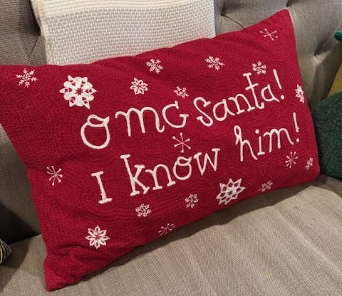 throw pillow with Elf reference: "OMG Santa! I know him!"