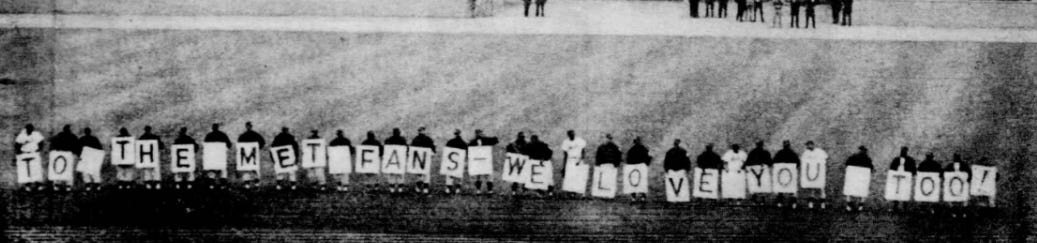 Mets players spelling out their own message on Banner Day. Mets players spelling out their own message on Banner Day.
