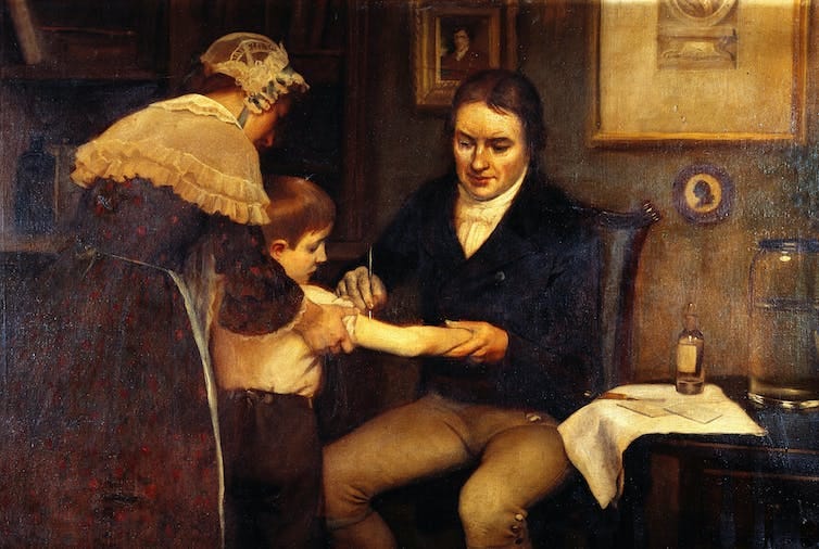 Edward Jenner vaccinating his first 'patient' against smallpox. Edward Jenner vaccinating his first 'patient' against smallpox.