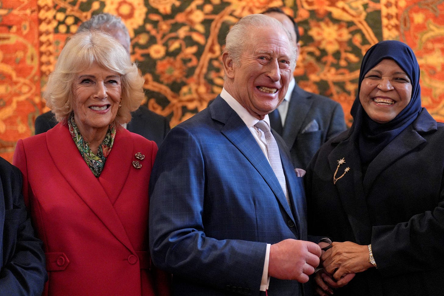 King Charles and Queen Camila smiling together King Charles and Queen Camila smiling together