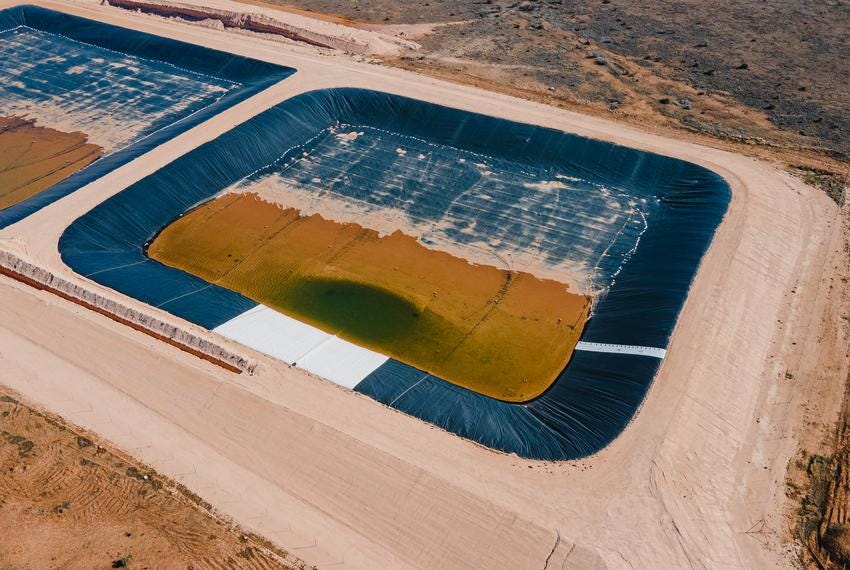 Produced water ponds, constructed by Martin Water, in Lenorah, on Feb. 24, 2024. The Railroad Commission approved the construction of the ponds, used to treat and recycle produced water from fracking, next to the Circle 6 Baptist Camp in the Permian Basin. Produced water ponds, constructed by Martin Water, in Lenorah, on Feb. 24, 2024. The Railroad Commission approved the construction of the ponds, used to treat and recycle produced water from fracking, next to the Circle 6 Baptist Camp in the Permian Basin.