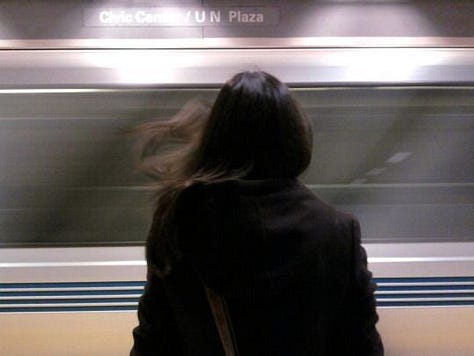 being the audience at ballet, a slogan regarding audacity and a woman watching a train go by