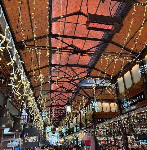 Scenes from Madrid at Christmas, including lights, markets, churros, decorations, and city streets at night.