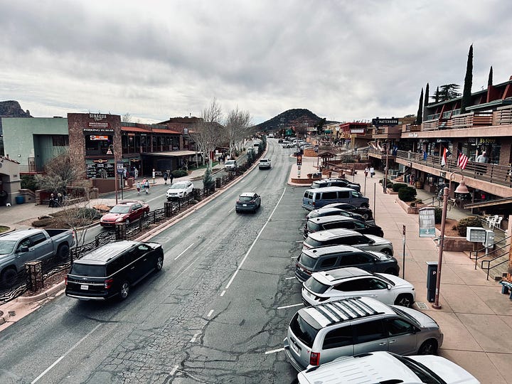 mountains, street, rocks, cars, people, walkway