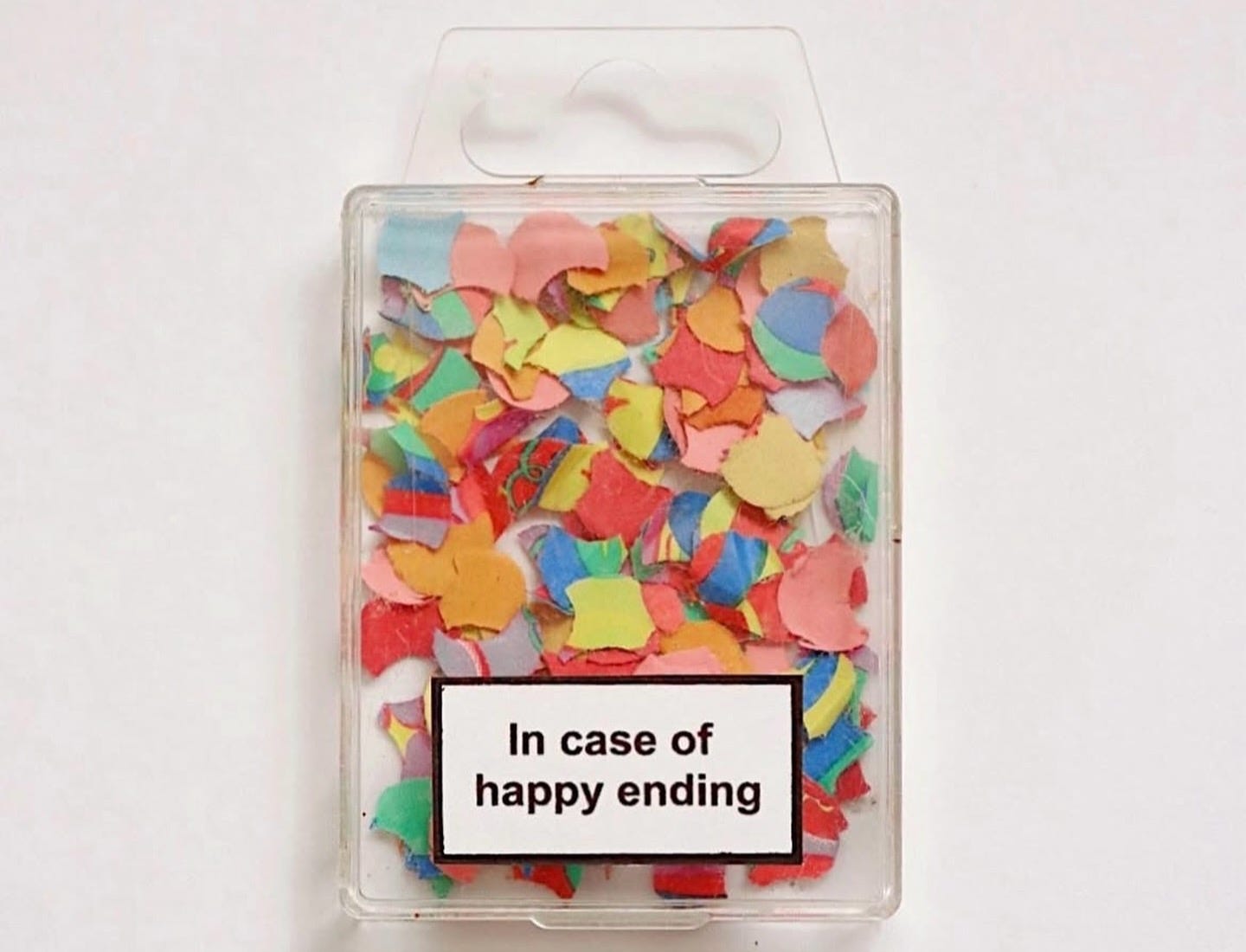 May be an image of paper weight, sharpener and text that says 'In of happy happyending ending'
