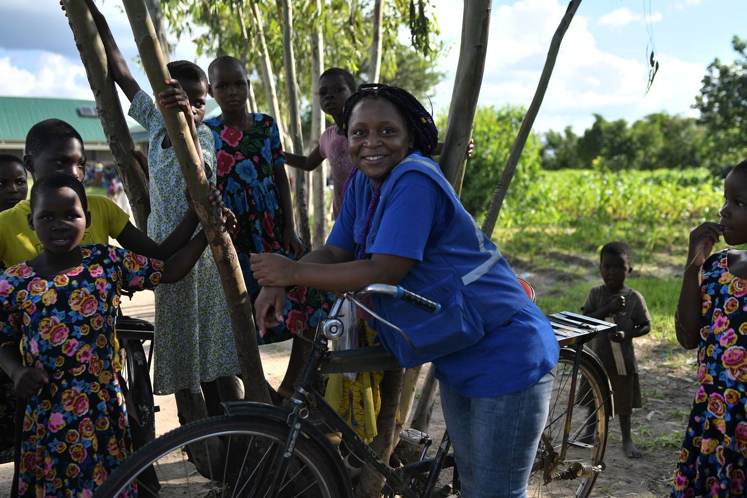 May be an image of 5 people, bicycle and outdoors May be an image of 5 people, bicycle and outdoors