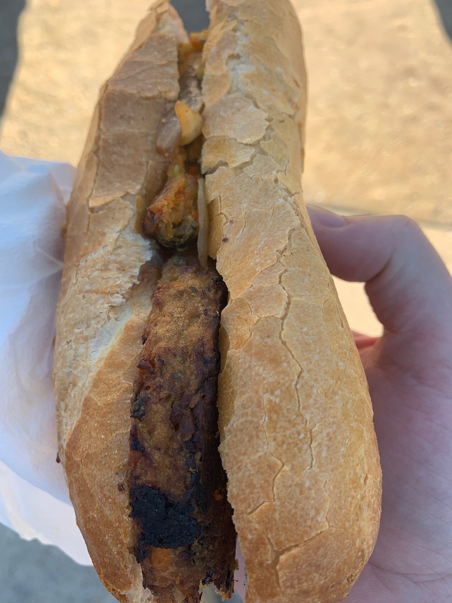 Photo of a veggie burger  in a bread roll
