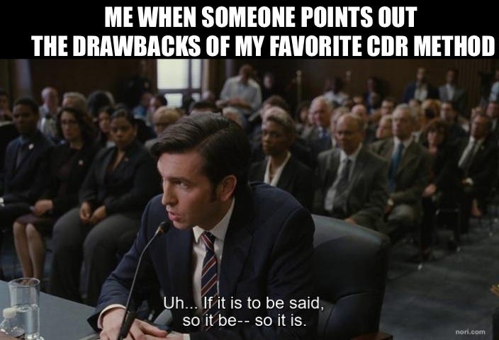 A man testifying at a crowded hearing, captioned "Me when someone points out the drawbacks of my favorite CDR method". Subtitle: "Uh... If it is to be said, so it be, so it is."