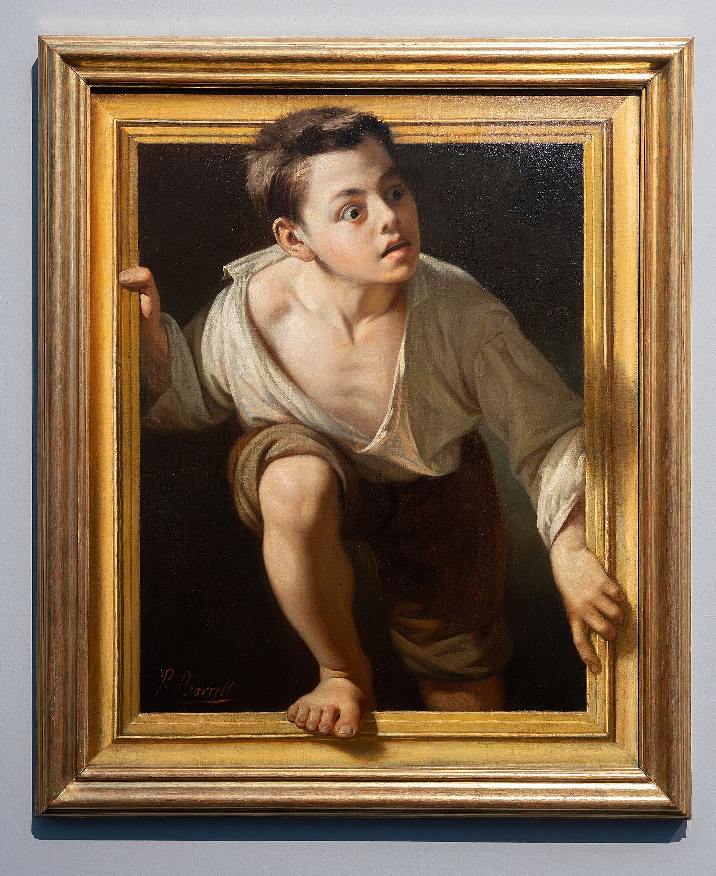 boy climbing out painted frame boy climbing out painted frame