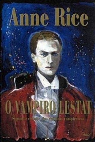 A imagem apresenta a capa do livro "O Vampiro Lestat", de Anne Rice, centralizada verticalmente contra um fundo completamente preto. No topo da capa, o nome da autora se destaca em letras amarelas com uma fonte estilizada de serifa fina. Abaixo do nome, a ilustração principal retrata o busto de um homem jovem de pele bastante pálida, cabelos castanhos penteados para trás e um olhar sério e fixo. Ele veste um traje formal escuro com colarinho branco bem estruturado e carrega um casaco ou capa de tom vermelho-escuro sobre os ombros. O fundo dessa ilustração mescla tons de azul-escuro com pequenas manchas claras que remetem a respingos de tinta ou a um céu estrelado. Na parte inferior da composição, o título "O VAMPIRO LESTAT" aparece escrito em letras maiúsculas vermelhas, com uma tipografia alongada e gótica que se sobrepõe ligeiramente à base da pintura do personagem.