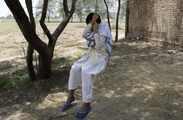 
              In this picture taken on May 4, 2017, a Pakistani boy who was allegedly raped by a mullah or religious cleric, sits on a swing in Kehror Pakka, Pakistan. An AP investigation has found that sexual abuse is a pervasive problem at madrassas, or Islamic schools, in Pakistan. But in a culture where clerics are powerful and sexual abuse is a taboo subject, it is seldom discussed or even acknowledged in public. It is even more seldom prosecuted. (AP Photo/K.M. Chaudary)
            