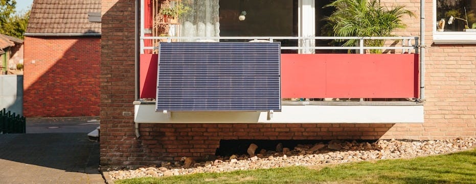 Red balcony screens on brick apartment building Red balcony screens on brick apartment building
