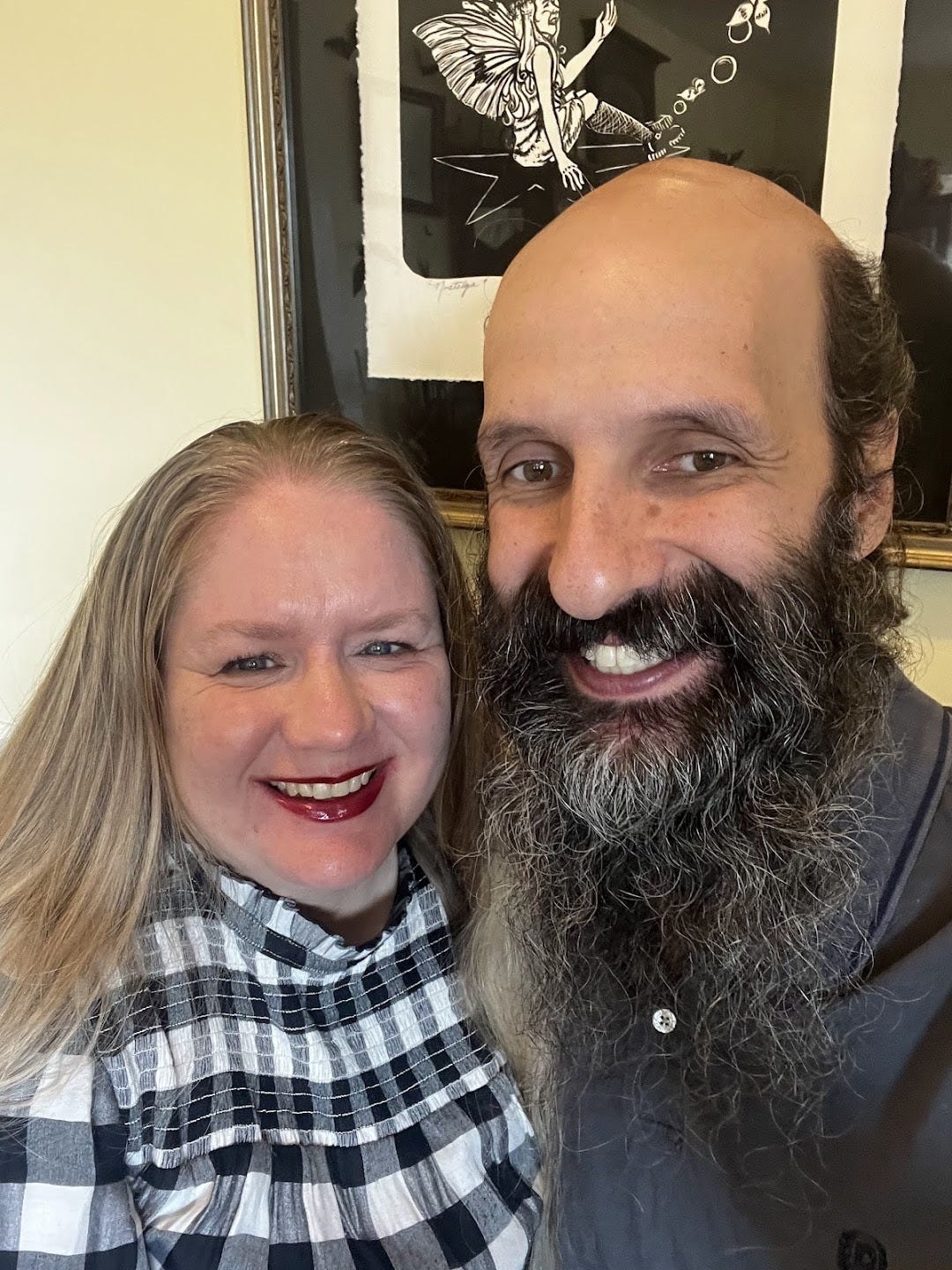 May be an image of one or more people, beard and people smiling