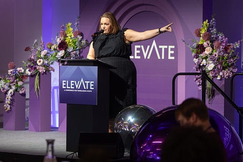 speakers and attendees at elevate