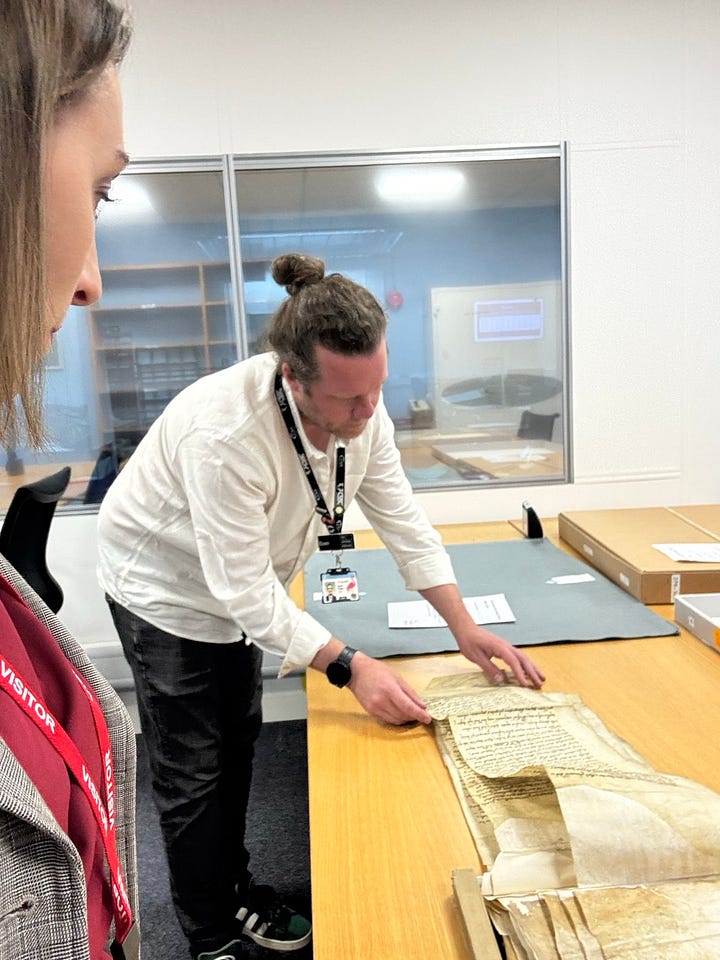 Dr Euan Roger removing Anne Boleyn's trial document from its protective package