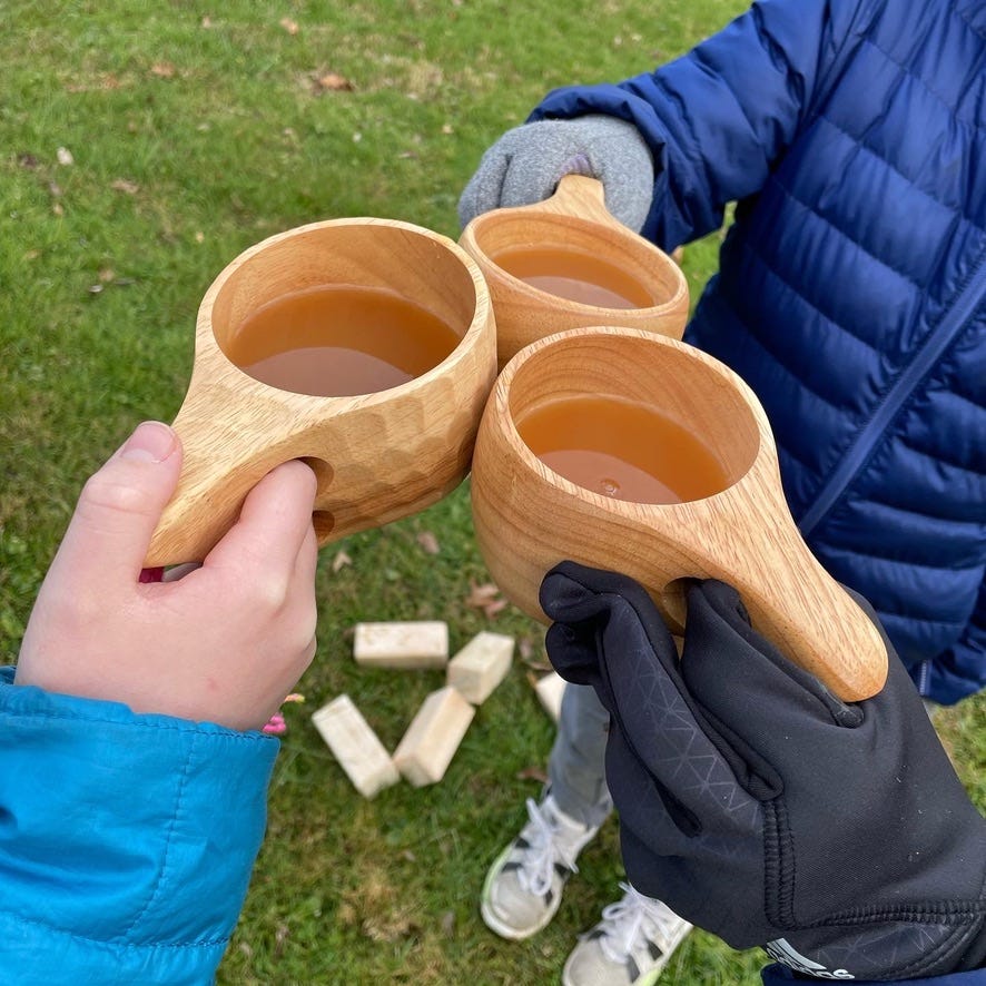 Kuksa cups together for a cheers