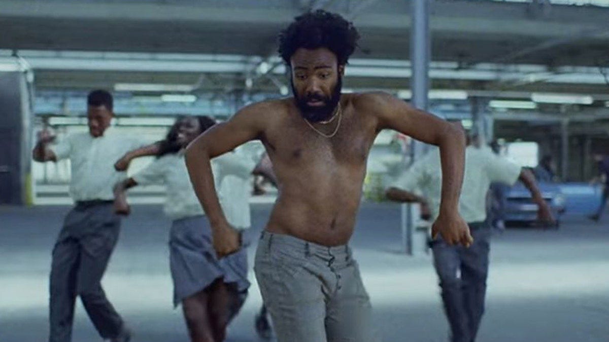 Donald Glover has taken 2018 by storm as both an actor and musician. Here the rapper dances in the music video for "This Is America." (RAC Records) Donald Glover has taken 2018 by storm as both an actor and musician. Here the rapper dances in the music video for "This Is America." (RAC Records)