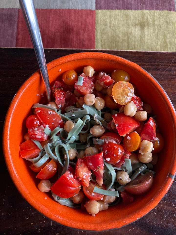 garbanzo and bow ties soup in a pot and a bowl of chickpeas, tomatoes, and noodles