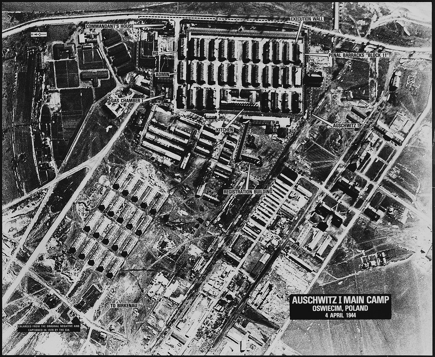 Black and white aerial reconnaissance photo of Auschwitz, showing building layout