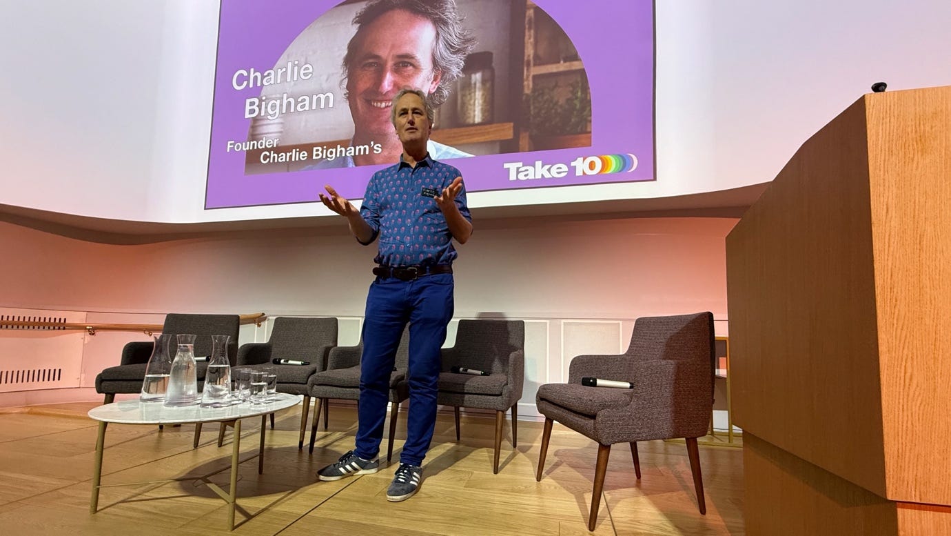 A person standing in front of a screen

AI-generated content may be incorrect.