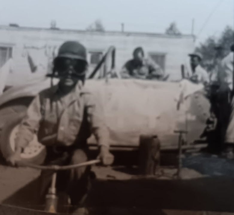 Mike of the Anchorage Memories Club, wearing the pilot's hat and goggles he wore (except for the goggles) to the first grade in Anchorage, Alaska circa 1950s.
