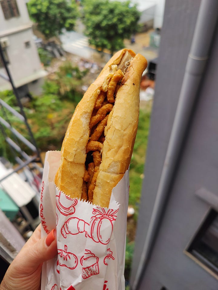 rainy street, banh mi sandwich