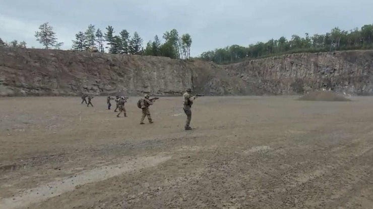 This photo was provided by the RCMP. The Mounties say it depicts the 'military-style training in which the accused took part.' 