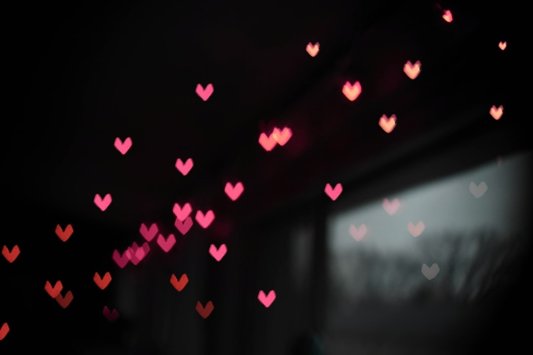 a room filled with lots of hearts hanging from the ceiling a room filled with lots of hearts hanging from the ceiling