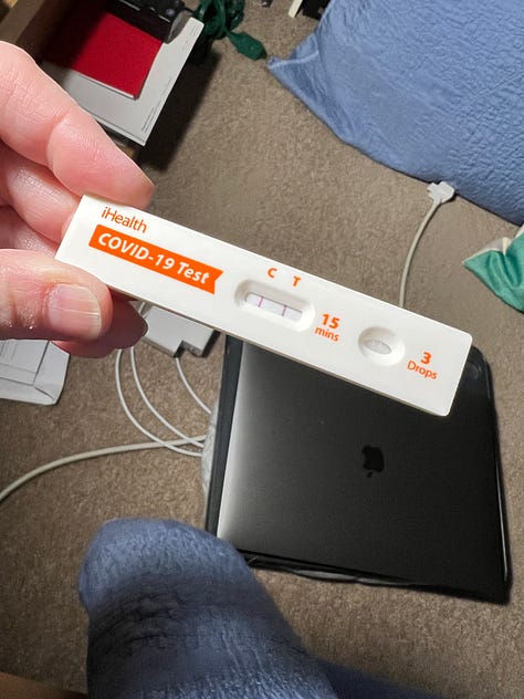 Images of a girl in a mask, a COVID-19 test and a box of Paxlovid