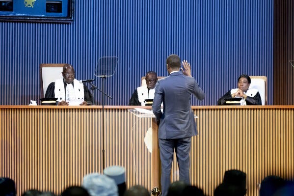 Bassirou Diomaye Faye is sworn in as Senegal's president in Dakar, Senegal, Tuesday, April 2, 2024. Faye, 44, campaigned on promises to clean up corruption and better manage the country's natural resources. His victory was seen as reflecting the will of young people frustrated with widespread unemployment and former colonial ruler France, seen by critics to be using its relationship with Senegal to enrich itself. (AP Photo/Sylvain Cherkaoui)