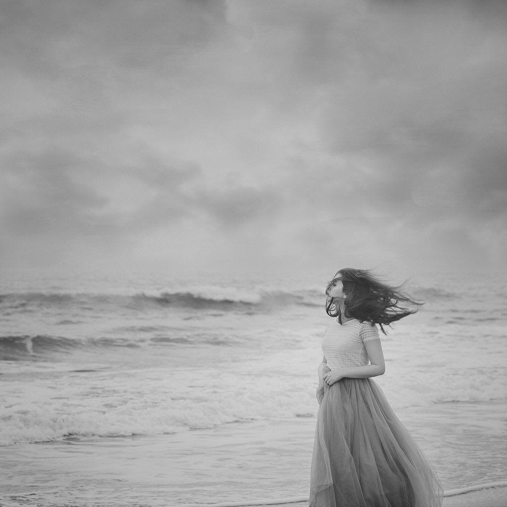 May be a black-and-white image of child and water May be a black-and-white image of child and water