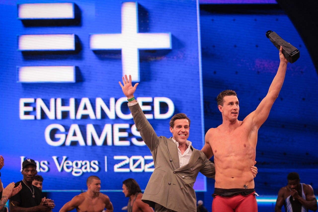 Enhanced CEO Max Martin and swimmer Kristian Gkolomeev in Las Vegas on May. Enhanced CEO Max Martin and swimmer Kristian Gkolomeev in Las Vegas on May.