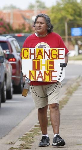 For 7 years, he's held a one-man protest outside of Redskins training camp