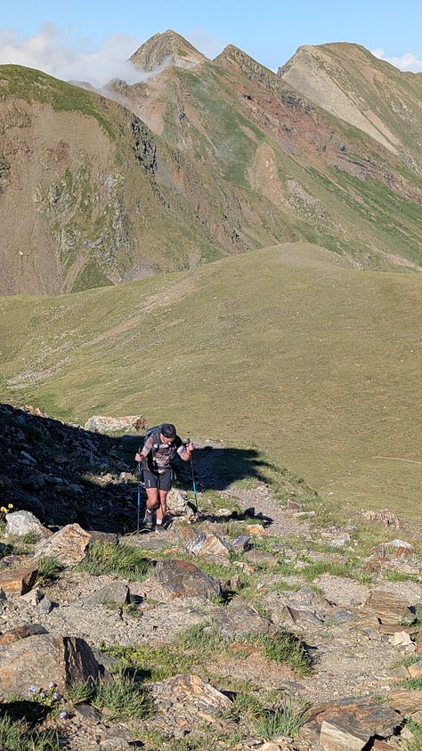 The final summit of the day with a happy Tom and Matt showing the grind.