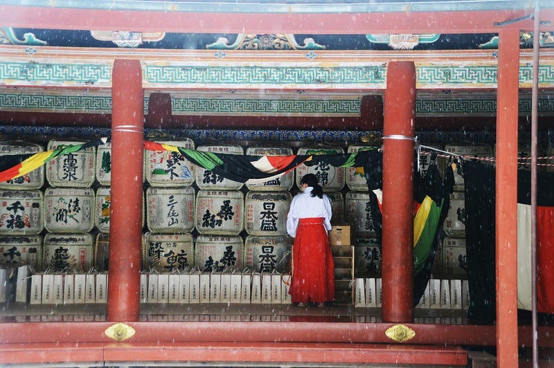 A shrine and a priest in Japan A shrine and a priest in Japan