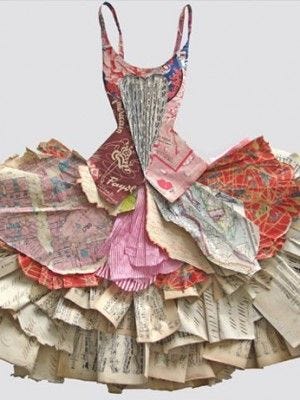 This may contain: a woman's dress made out of old newspaper pages is shown in this image